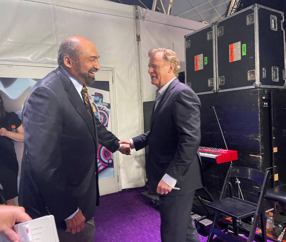 NFL legend Franco Harris and NFL Commissioner Roger Goodell share amount backstage of the NFL d ...