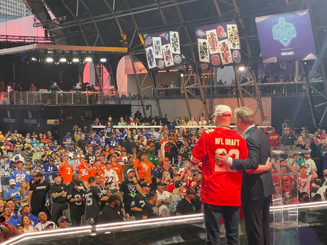 NFL Commissioner Roger Goodell poses with a Kansas City Chiefs fan, who took part in the team's ...