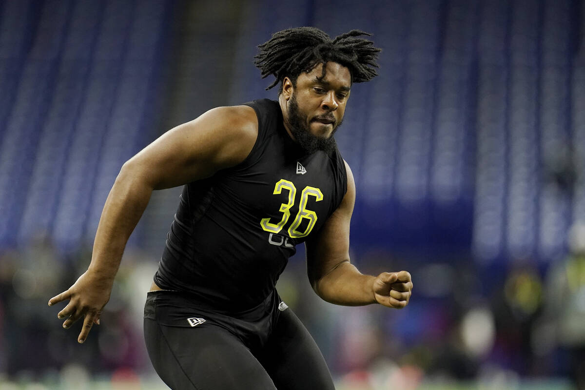 Memphis offensive lineman Dylan Parham (36) participates in drills at the NFL football scouting ...