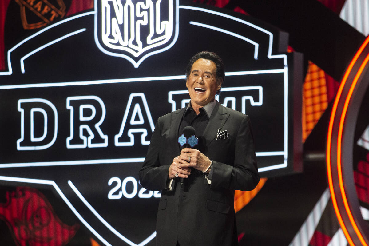 Wayne Newton stands on the stage after announcing the Raiders 90th overall draft selection duri ...