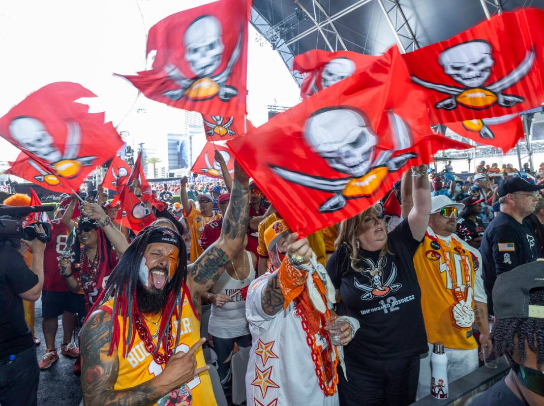 Tampa Bay Buccaneers fans cheer at the Draft Theater during the second day selections for the 2 ...