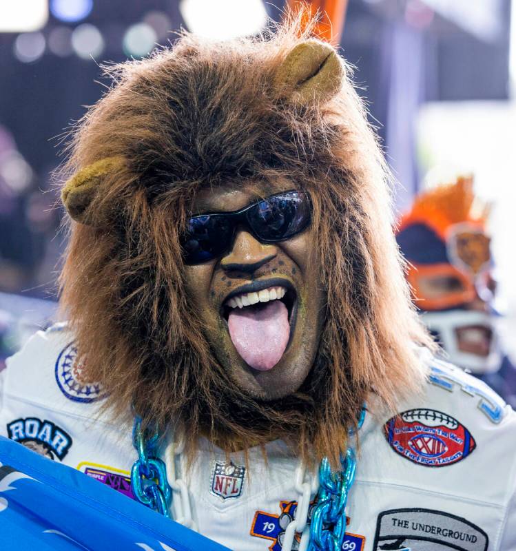 A Detroit Lions fan has fun at the Draft Theater during the second day selections for the 2022 ...