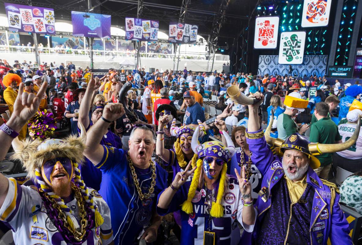 Minnesota Vickings fans cheer during day two of the NFL draft on Friday, April 29, 2022, in Las ...