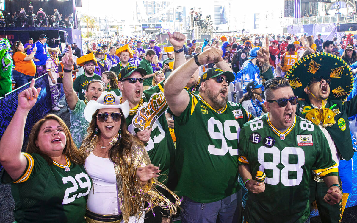 Green Bay Packers fans cheer during day two of the NFL draft on Friday, April 29, 2022, in Las ...