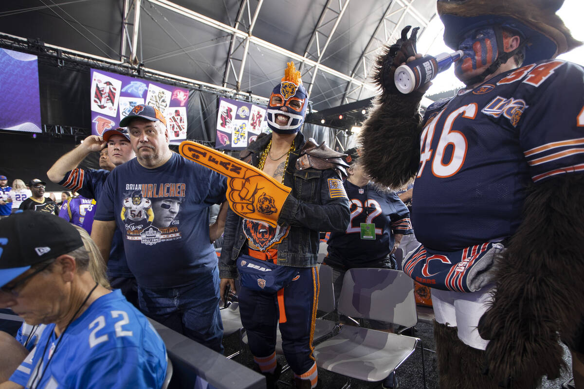 Fans get ready for the start of the second day of the NFL Draft event in Las Vegas, Friday, Apr ...