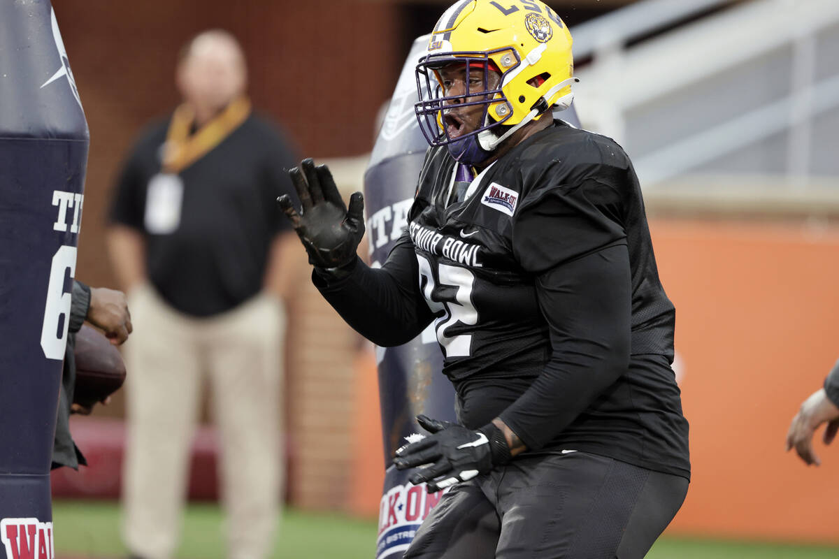 American Team defensive lineman Neil Farrell Jr. of LSU runs through drills during practice for ...