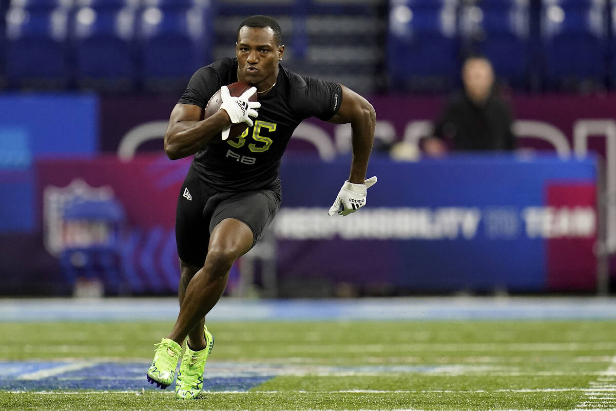 Georgia running back Zamir White (35) participates in a drill at the NFL football scouting comb ...