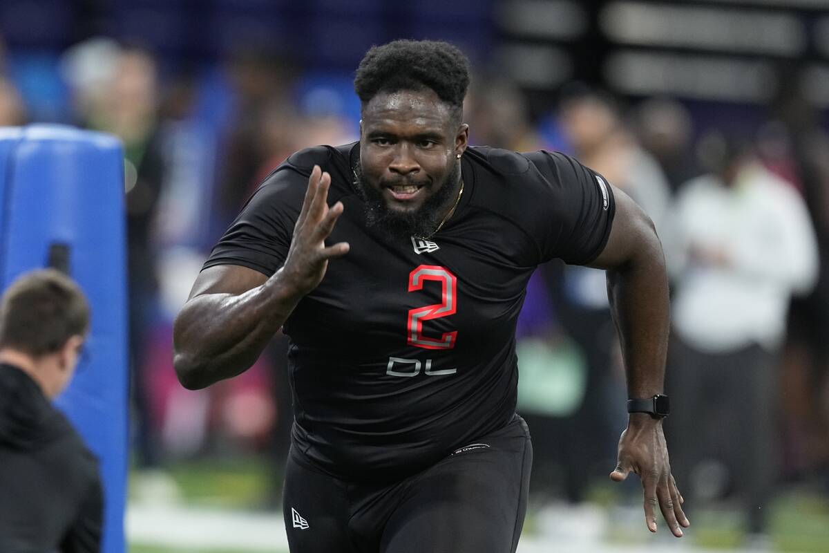 Tennessee defensive lineman Matthew Butler runs a drill during the NFL football scouting combin ...