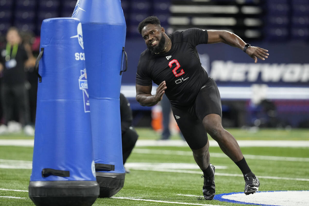 Tennessee defensive lineman Matthew Butler runs a drill during the NFL football scouting combin ...