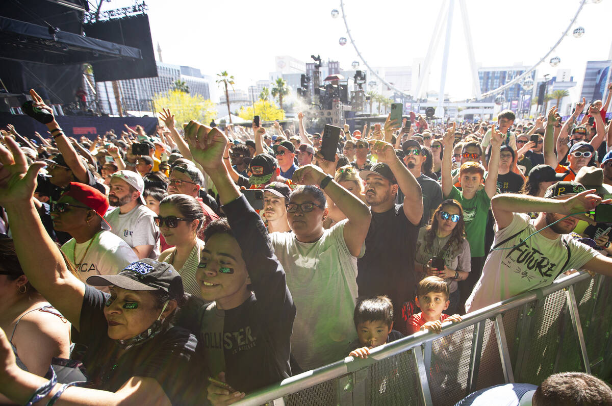 Fans cheer as Marshmello performs during the third day of the NFL draft on Saturday, April 30, ...