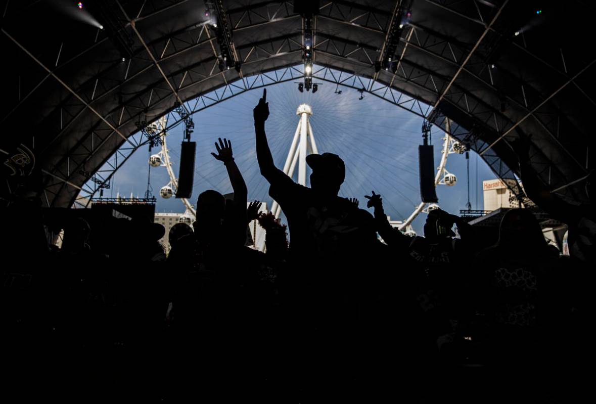 Raiders fans celebrate after Las Vegas made a draft pick during day three of the NFL draft on S ...