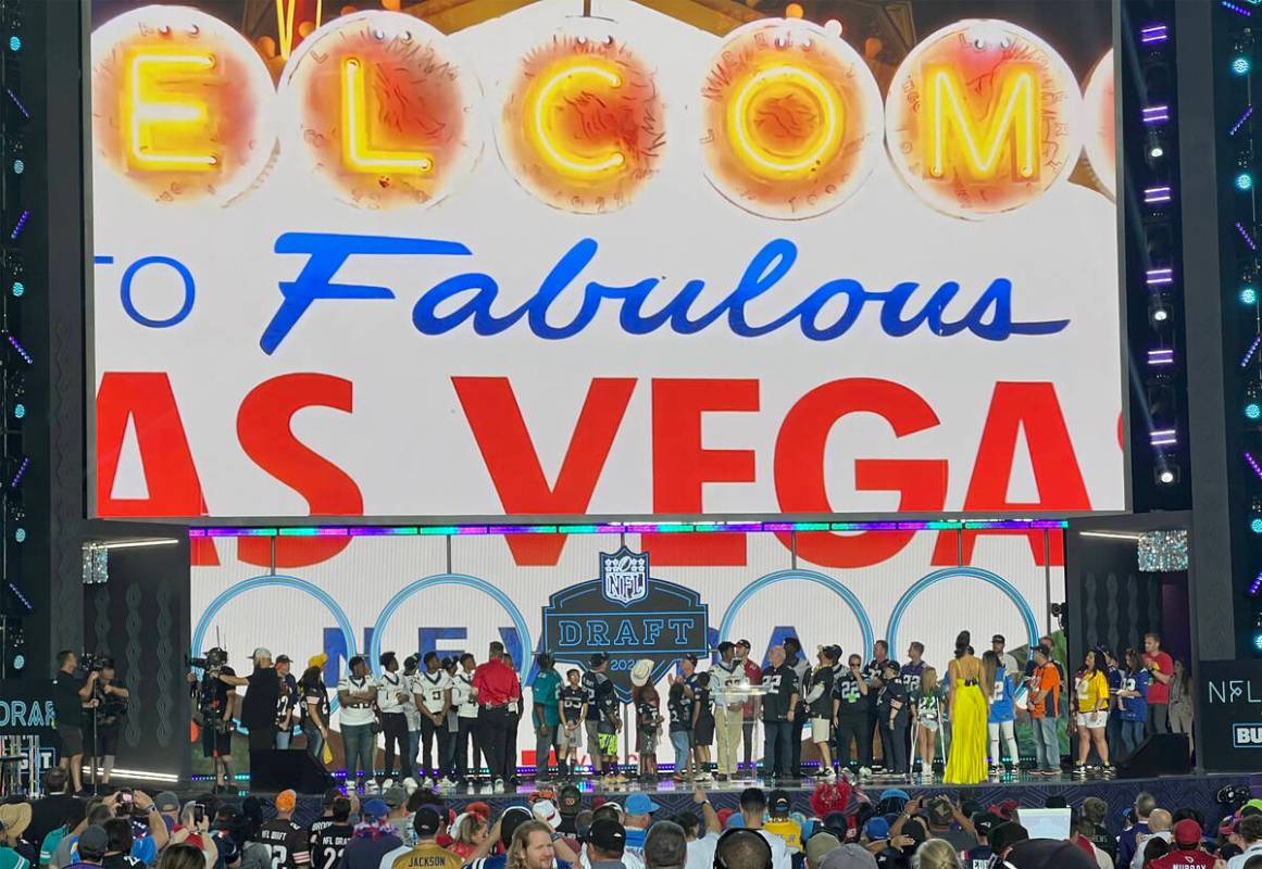 Youth football players are honored on the main stage at the NFL Draft Experience during the fin ...