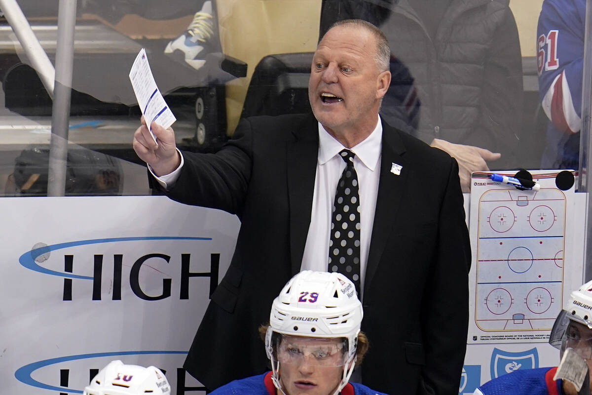 New York Rangers head coach Gerard Gallant gives instructions during the first period of an NHL ...