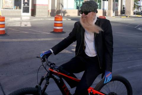 Las Vegas resident and ZZ Top frontman Billy Gibbons rides up the Strip in Las Vegas with Las V ...