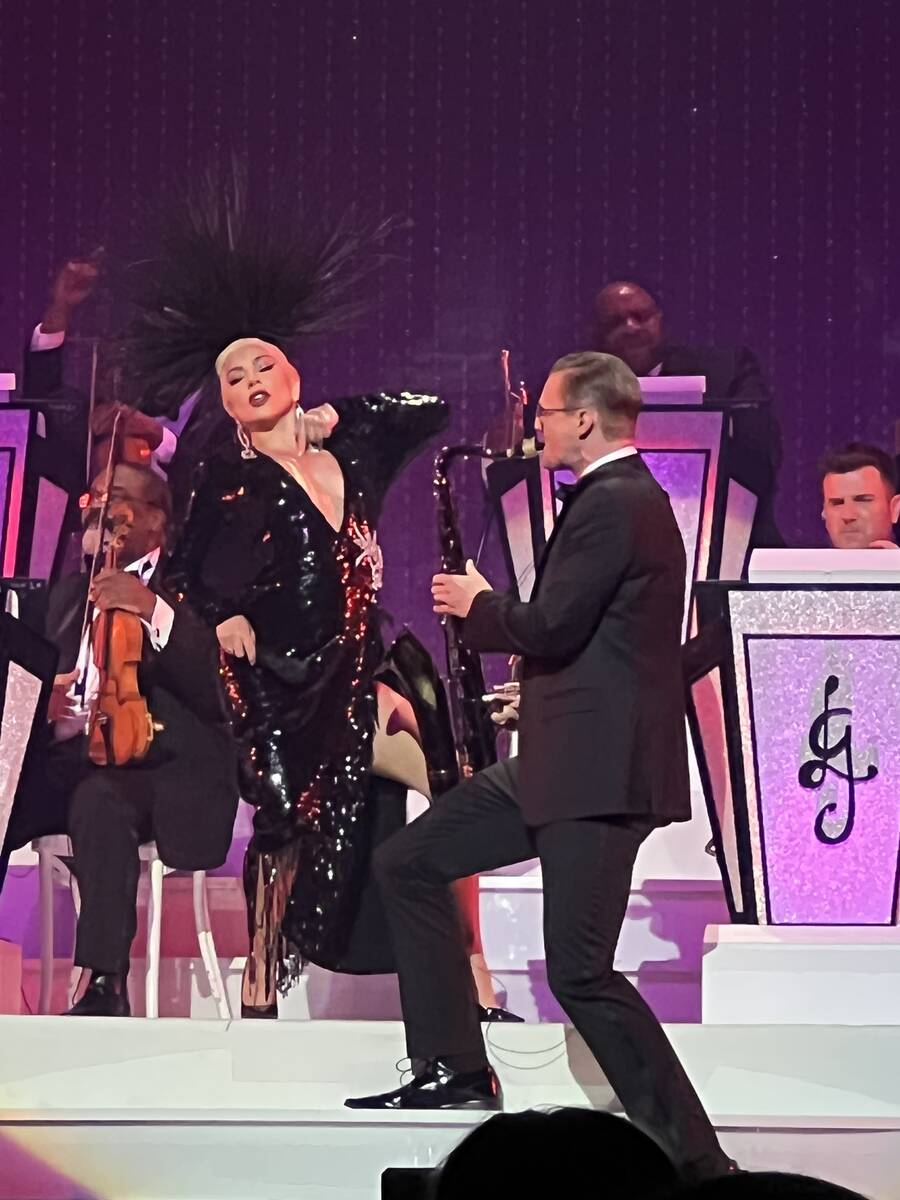 Lady Gaga is shown with sax player Steve Kortyka at Dolby Live at Park MGM on Sunday, May 1, 20 ...