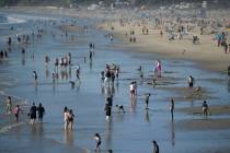 People enjoy the beach, Feb. 12, 2022, Santa Monica, Calif. (AP Photo/Mike Stewart)