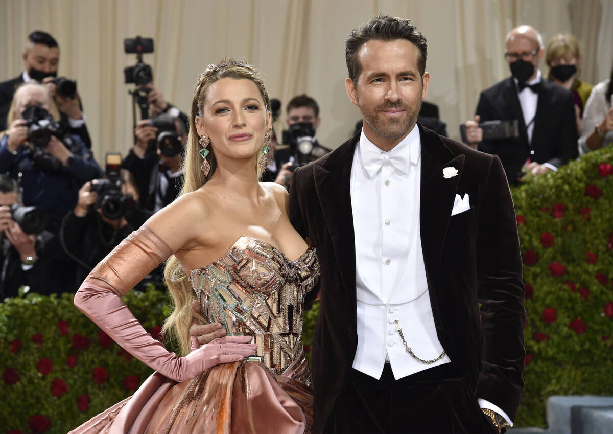 Blake Lively, left, and Ryan Reynolds attend The Metropolitan Museum of Art's Costume Institute ...