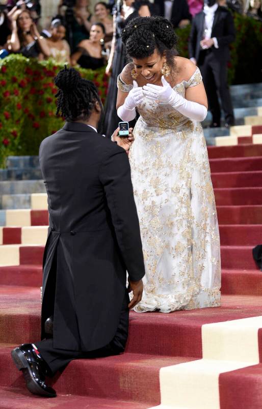 Former New York State Assembly candidate Bobby Digi Olisa, left, proposes to Laurie Cumbo, Comm ...