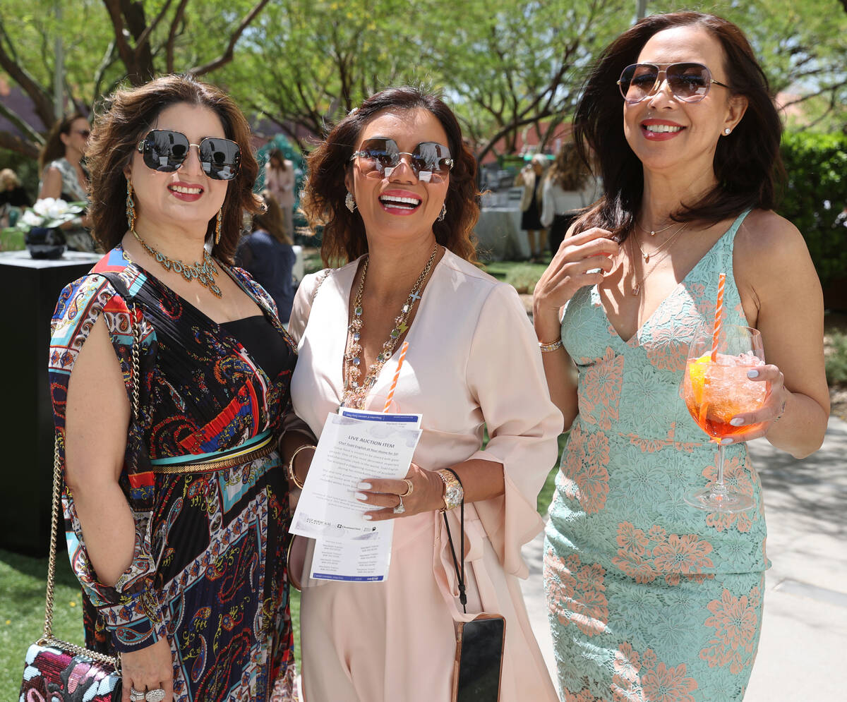 Aisha Zaidi, from left, Maribeth Trainor and Judith Caro, all of Las Vegas, during a Mother's D ...