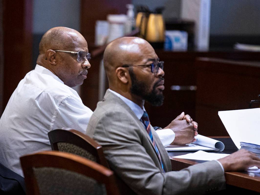 Wendell Melton, left, accused of killing his 14-year-old son in 2017, and his attorney Jonathan ...