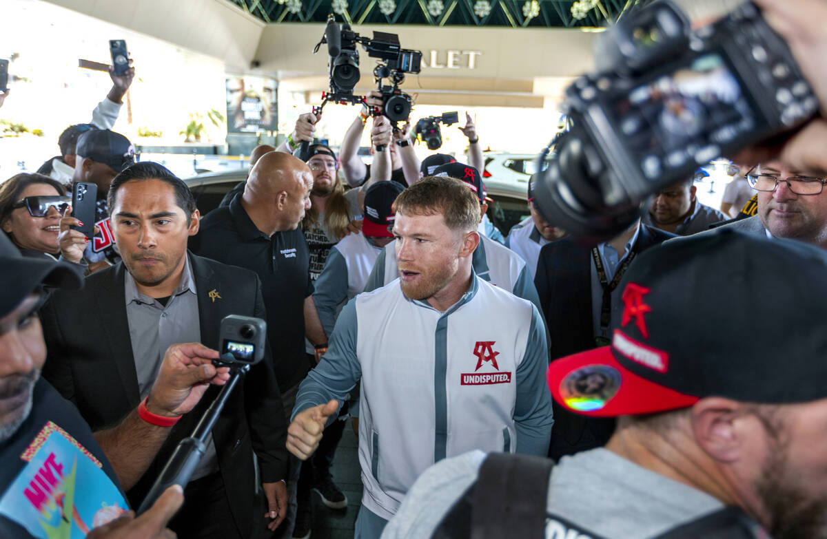 Canelo Alvarez exits his car to the cheering of fans during boxing Grand Arrivals at the MGM Gr ...