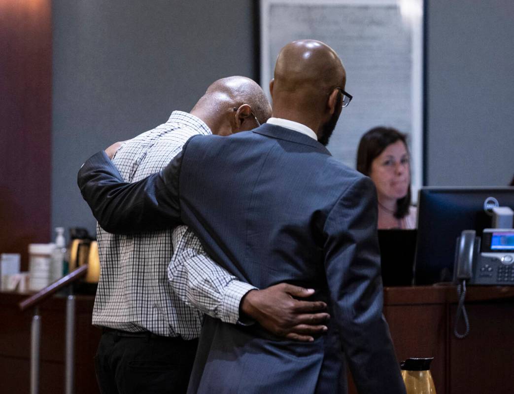 Wendell Melton, left, is comforted by his attorney Jonathan MacArthur on Wednesday, May 4, 2022 ...