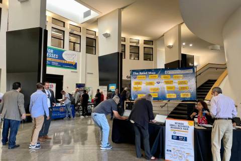 People walk around the Small Business Resource Fair on Wednesday, May 4, 2022, at the Sahara We ...
