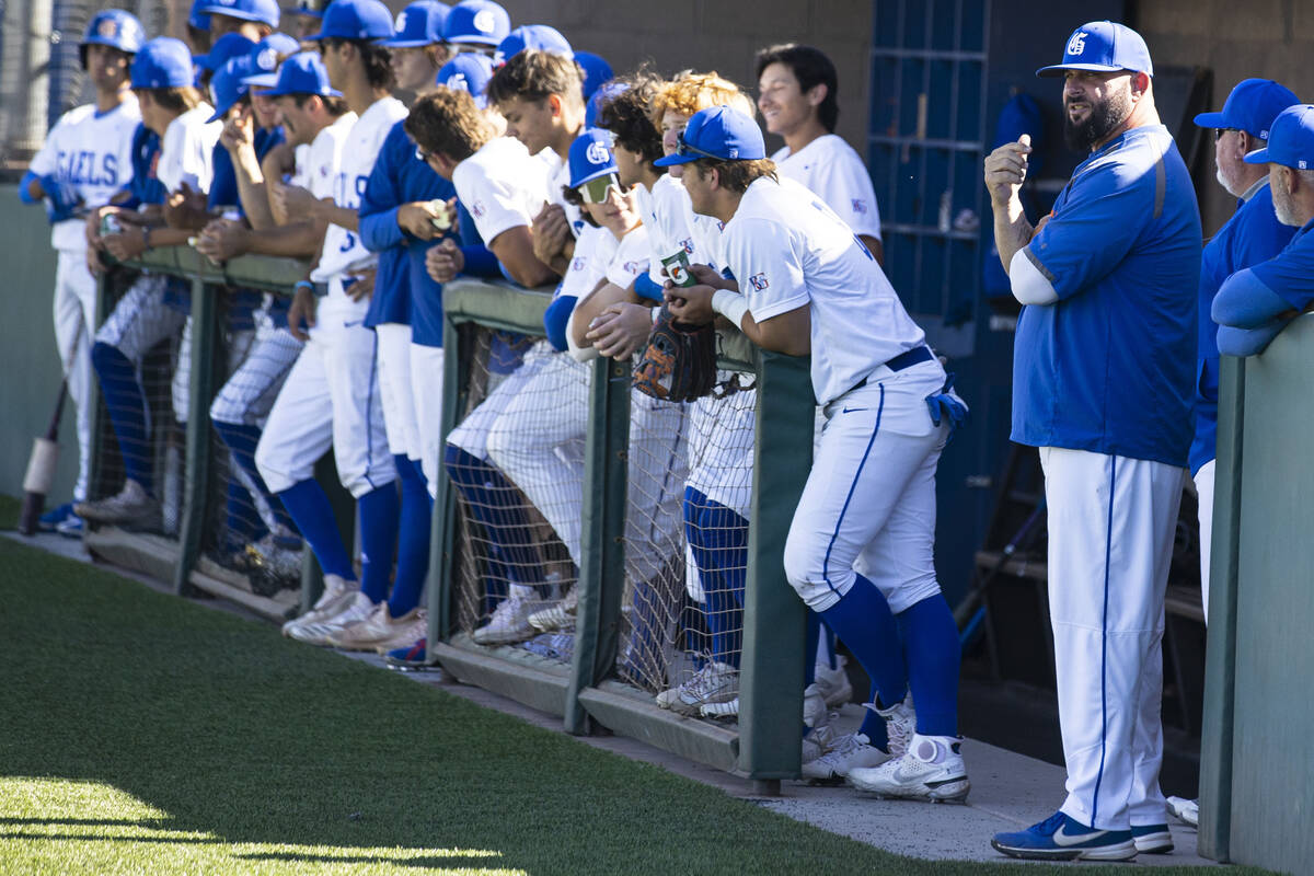 The Bishop Gorman baseball head coach Gino DiMaria, right, watches his players during a playoff ...