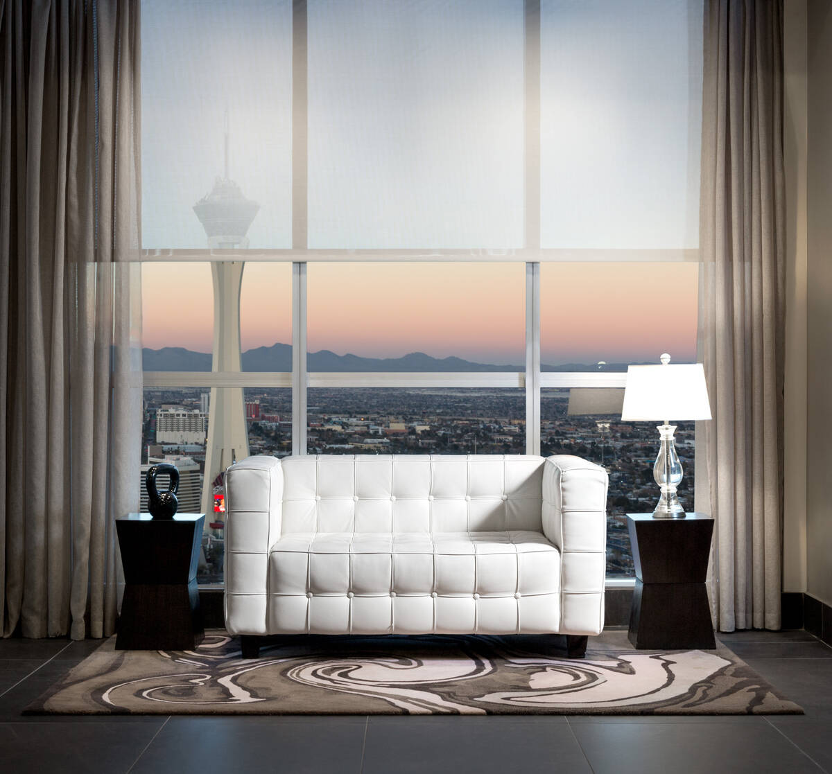 The large windows in high-rise condos are perfect custom motorized shades. (DropShade)
