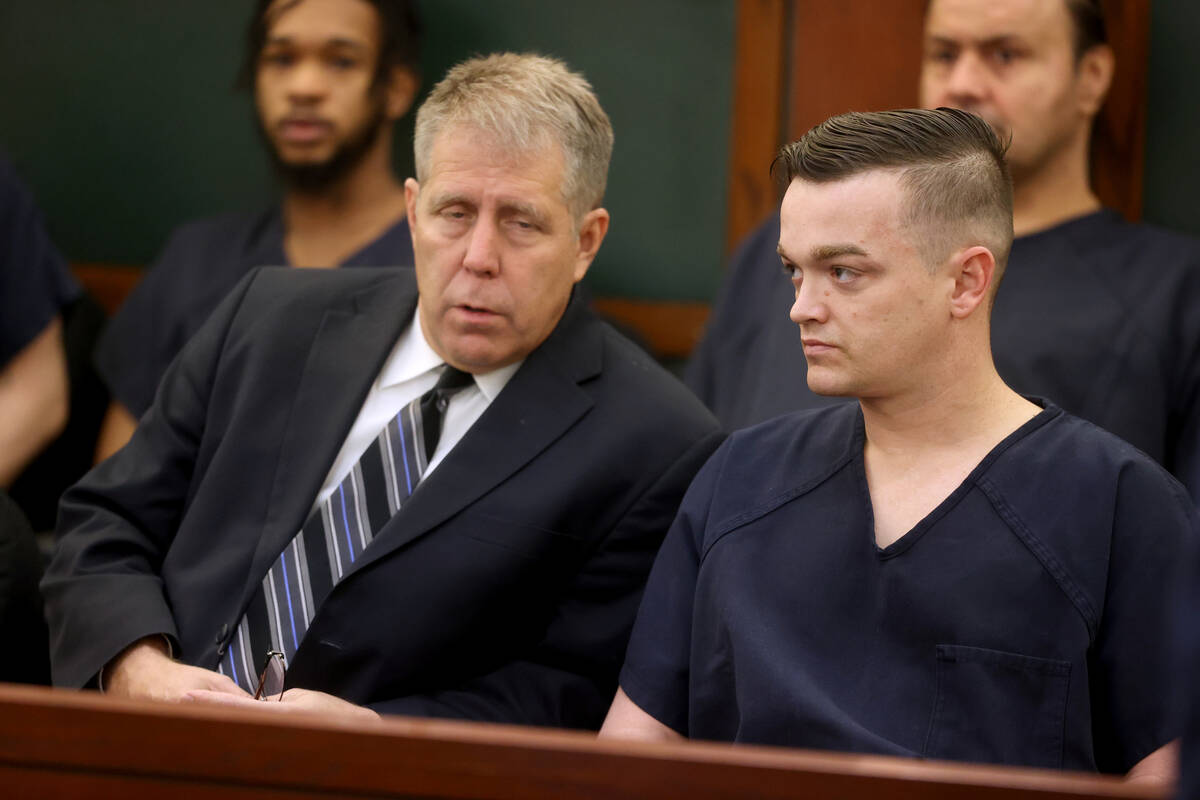Brandon Toseland, 35, right, talks to his attorney, Craig Mueller, in court at the Regional Jus ...