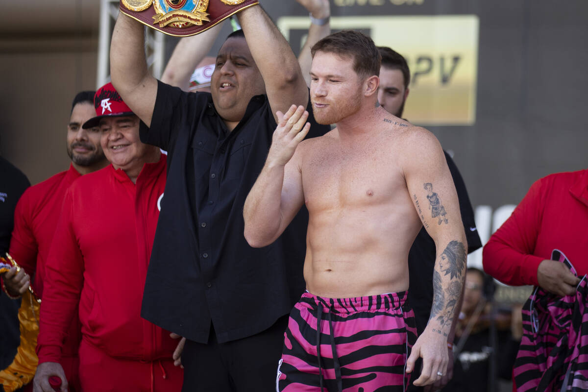 Saul “Canelo” Alvarez gestures on stage during a ceremonial weigh-in event at Tos ...