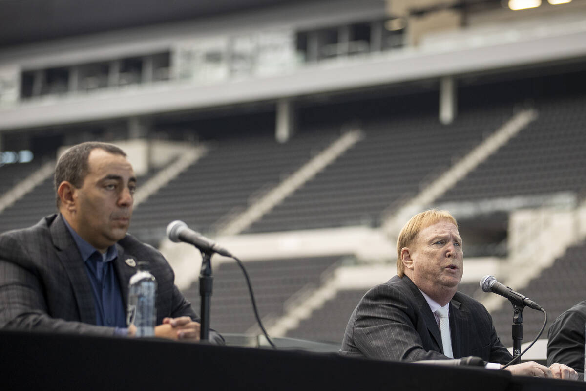 Las Vegas Raiders president Dan Ventrelle, from left, owner Mark Davis, and CLEAR'S senior vice ...