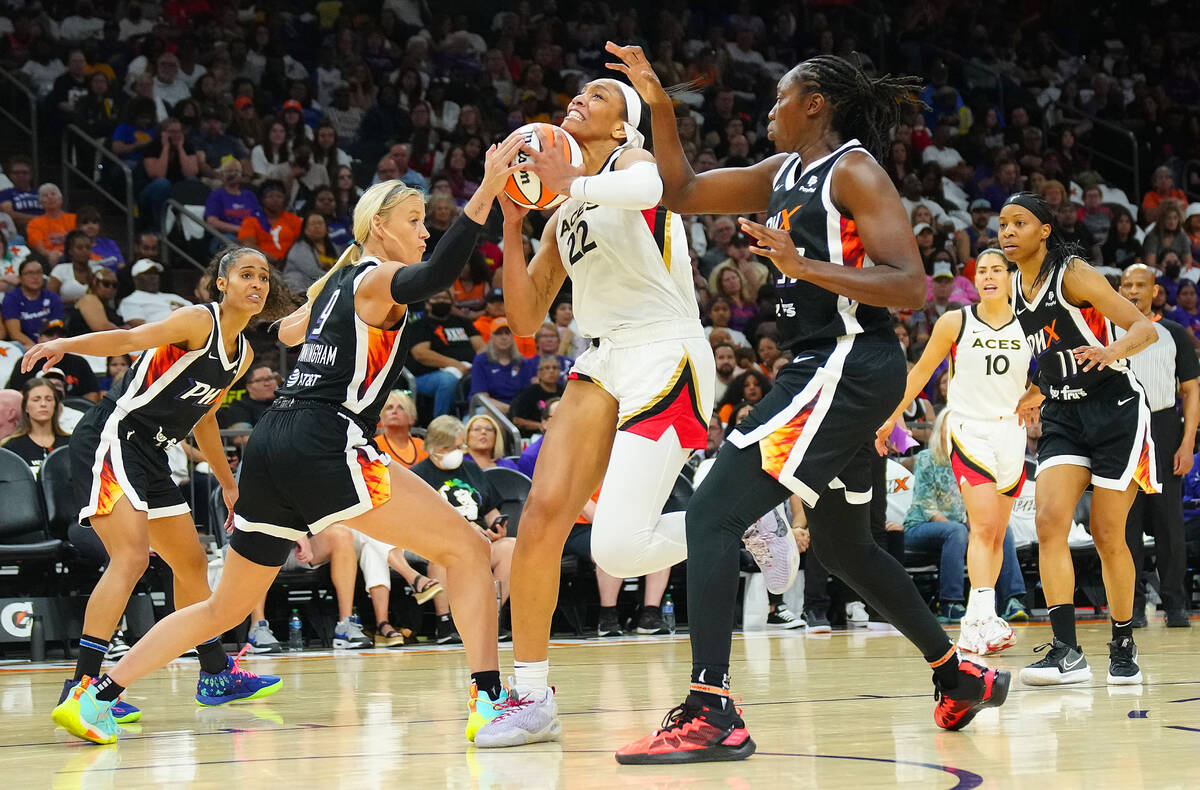 May 6, 2022; Phoenix, Arizona; USA; Mercuryճ Sophie Cunningham (9) fouls AcesՠA&#x5 ...