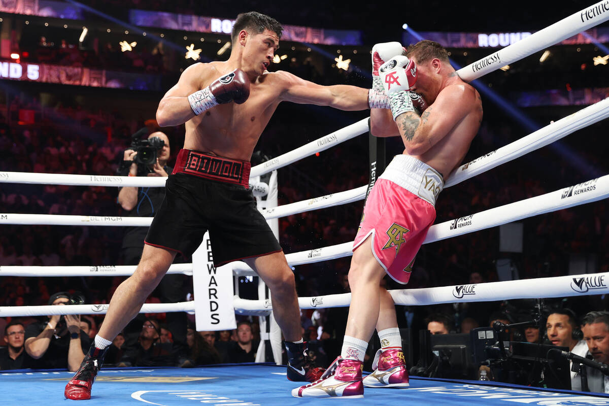Dmitry Bivol connects a punch against Saul “Canelo” Alvarez in the fifth round of ...