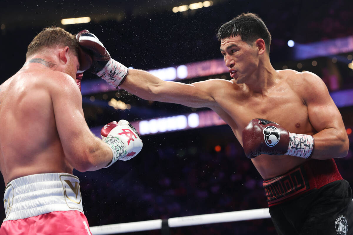 Dmitry Bivol connects a punch against Saul “Canelo” Alvarez in the sixth round of ...