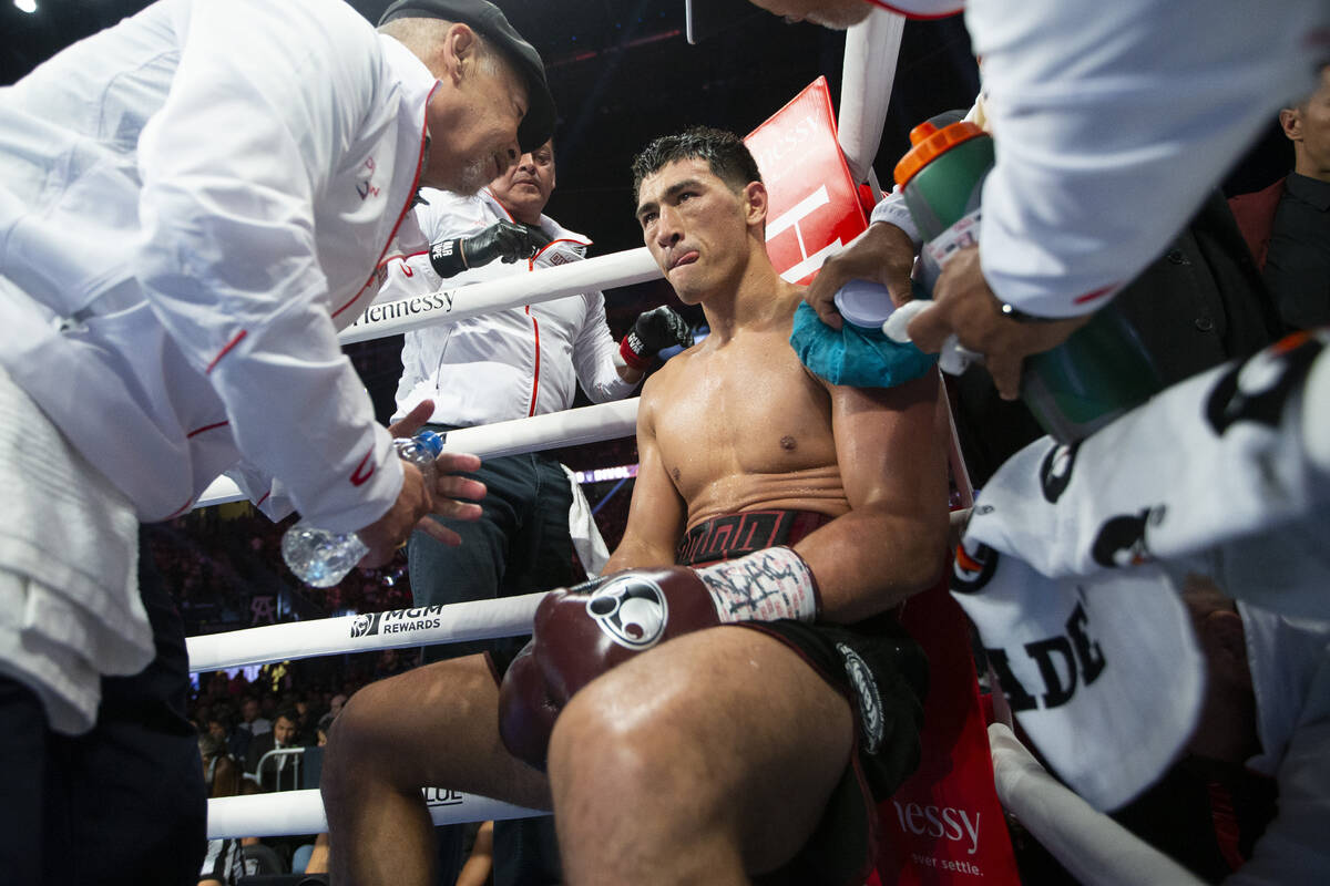 Dmitry Bivol sits on his corner in between rounds of the WBA super light heavyweight title bout ...