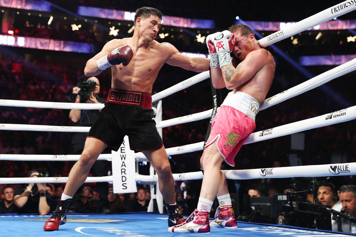 Dmitry Bivol, left, throws a punch against Saul “Canelo” Alvarez in the fifth rou ...