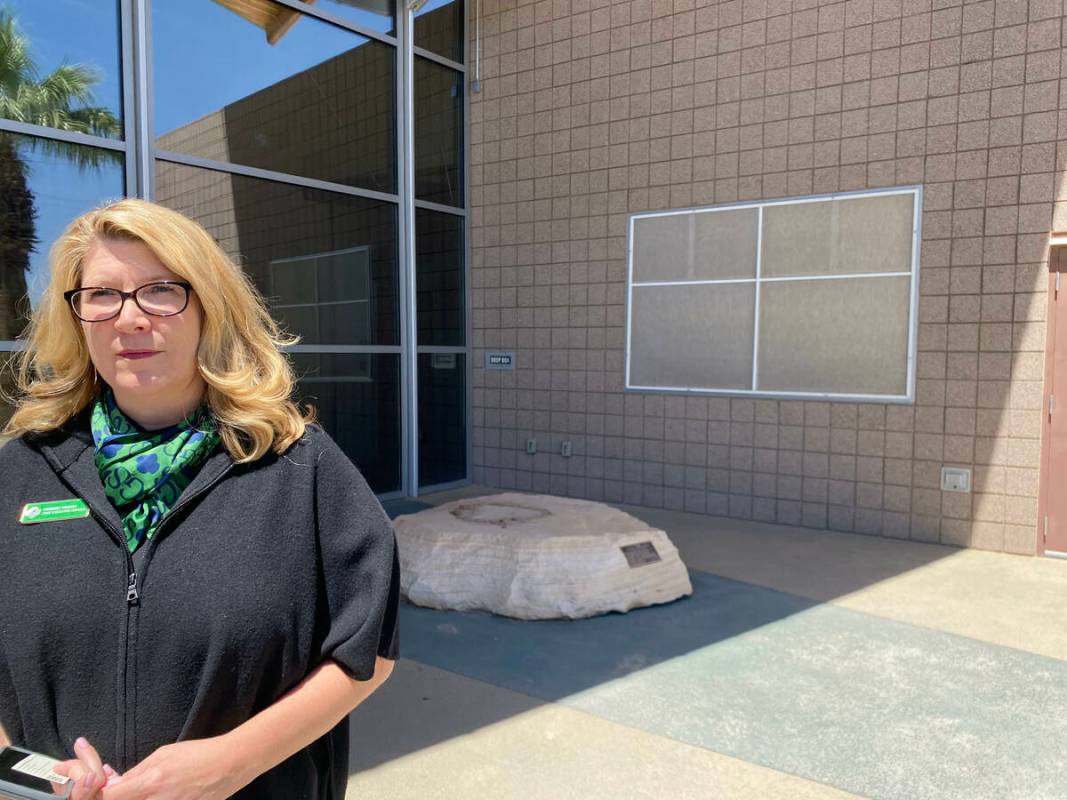 Kimberly Trueba, CEO of the Girl Scouts of Southern Nevada, stands in front of a pedestal where ...