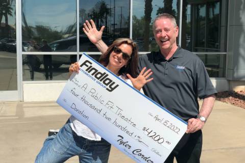 Findlay Automotive Group's Tyler Corder presents a check to Ann Marie Pereth, co-founder and an ...