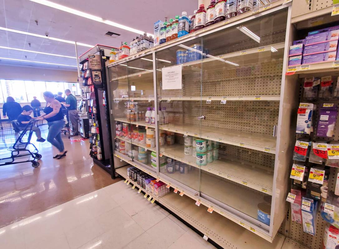 Near-empty shelves of baby formula are seen at an Albertsons grocery store on Thursday, May 12, ...