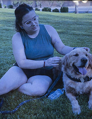 A photo of Tina Tintor, 23, and her dog. (Bizuayehu Tesfaye/Las Vegas Review-Journal)