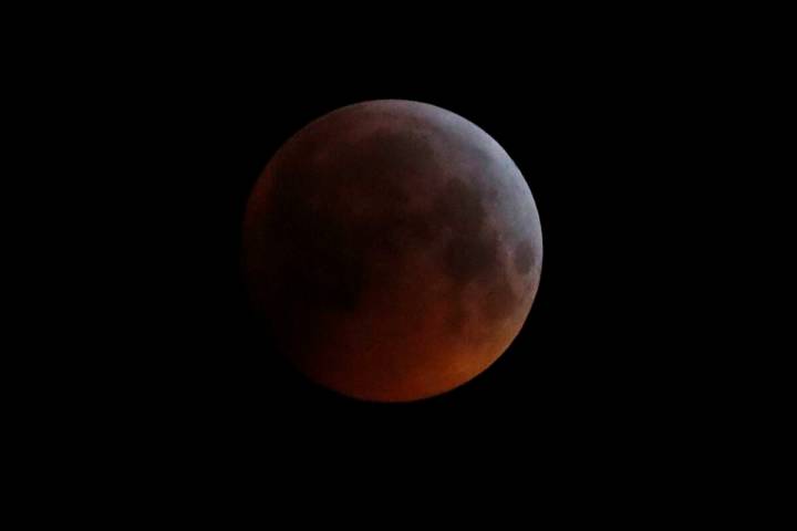 In this Monday, Jan. 21, 2019 file photo, the Earth's shadow falls across the full moon seen ab ...