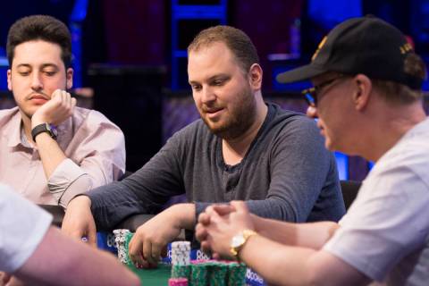 Scott Seiver, center, plays during the final day of the High Roller for One Drop No-Limit Hold' ...