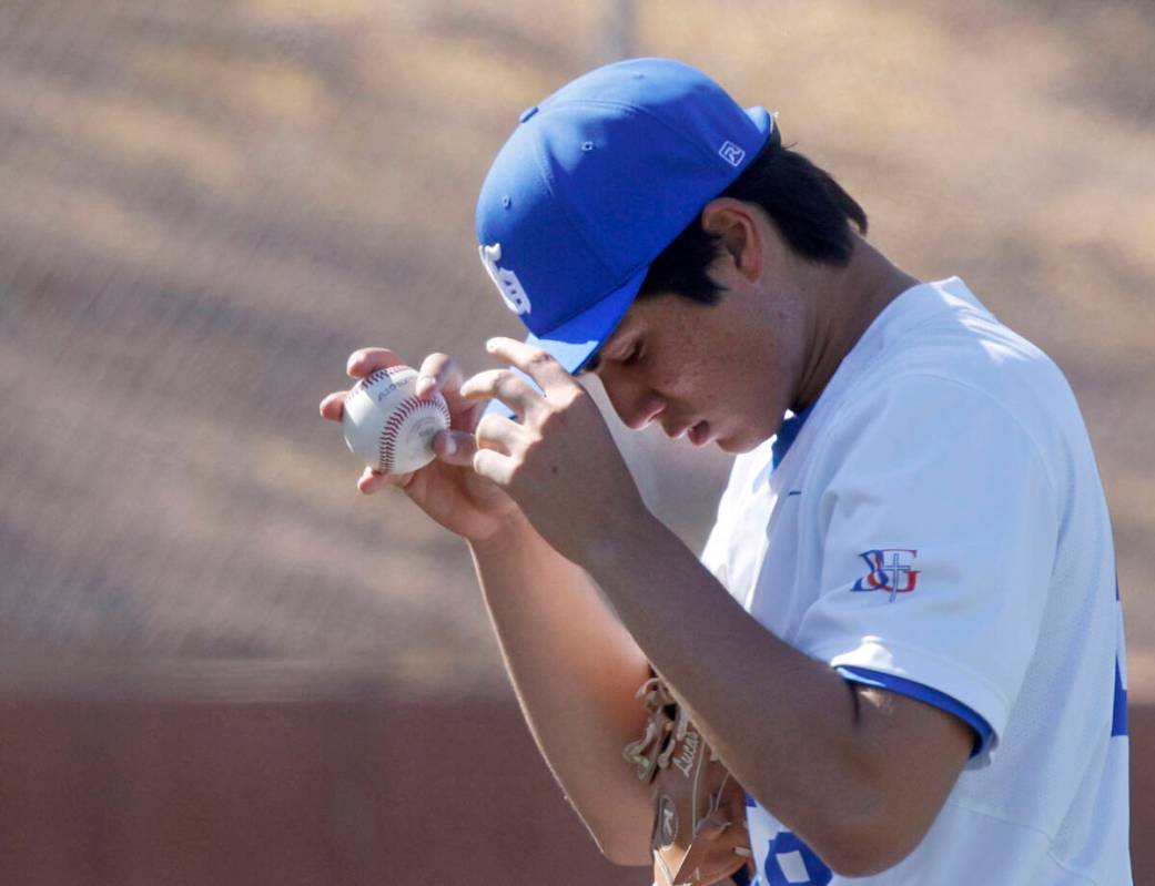 Bishop Gorman pitcher Lucas Boesen fixes his cap during the forth inning of a baseball game aga ...