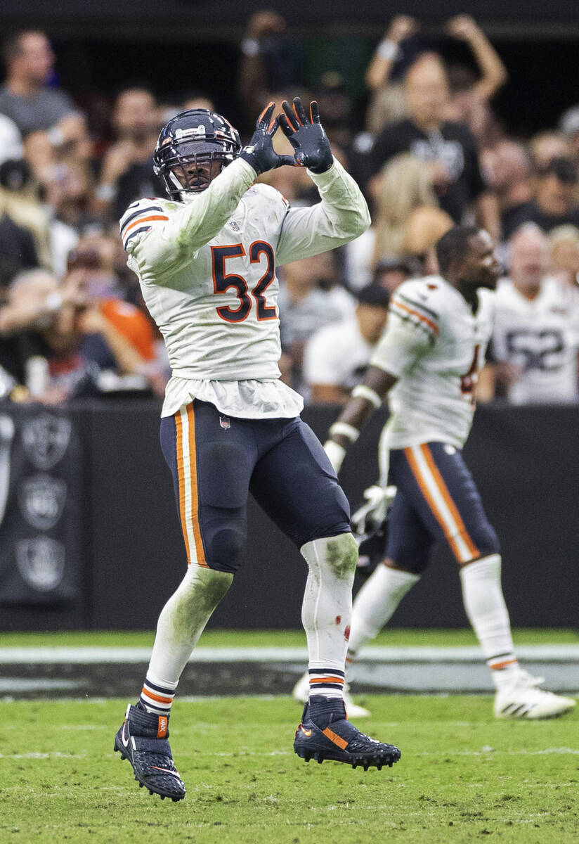 Chicago Bears outside linebacker Khalil Mack (52) celebrates a big defensive play in the second ...