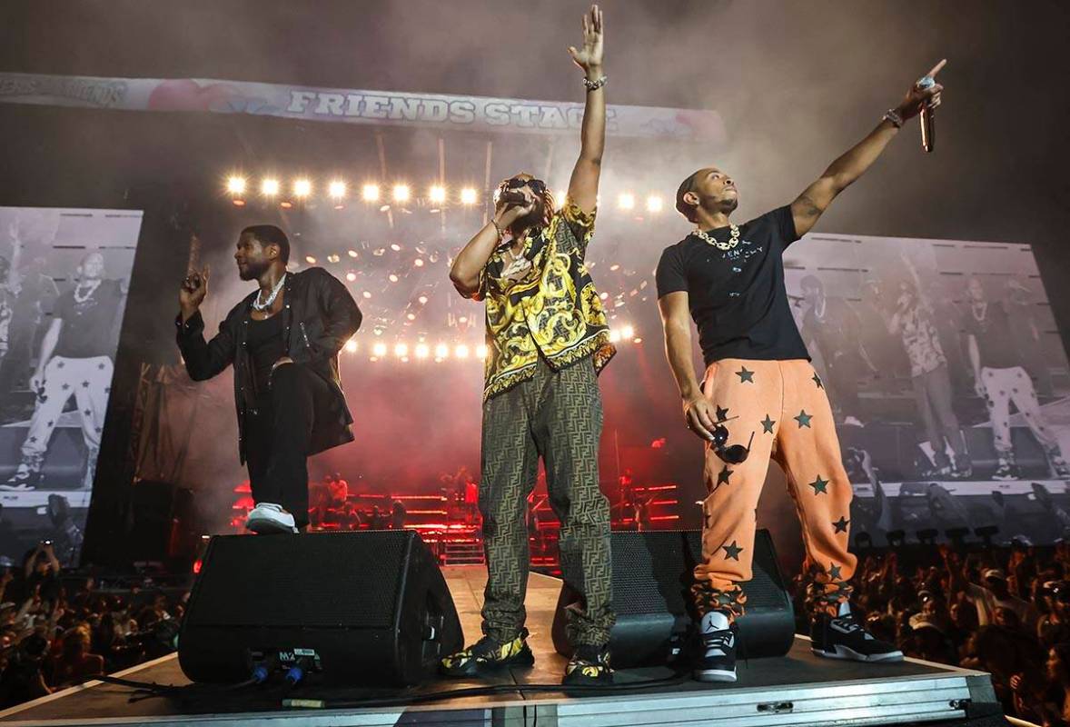 Usher, from left, Lil Jon, and Ludacris performs during the Lovers & Friends music festival ...
