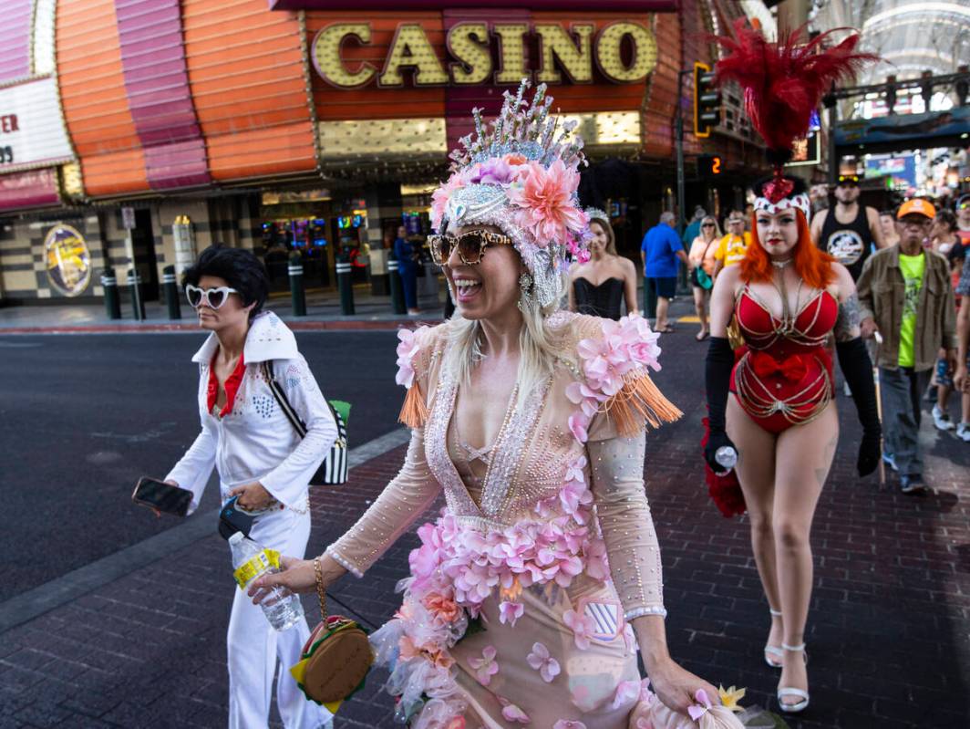 Ily Royale w/ Cheese participate in the Las Vegas Showgirl parade walk along the Fremont Street ...