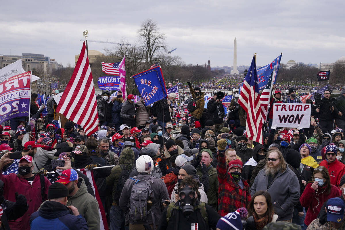 Trump supporters gather outside the Capitol, Wednesday, Jan. 6, 2021, in Washington. (AP Photo/ ...