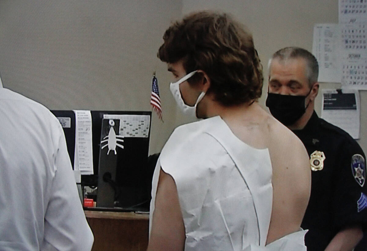 In a photo shot from television, Payton Gendron is arraigned before a judge, Saturday, May 14, ...