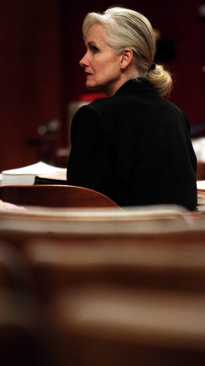 Margaret Rudin sits in an empty courtroom waiting for her attorneys to arrive in this undated p ...